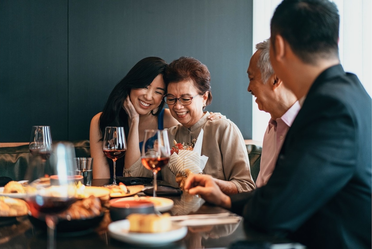 Family enjoying a meal at a local restaurant